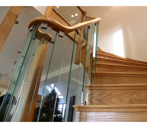 Close up of curved stairs with glass Close up of curved stairs with glass
